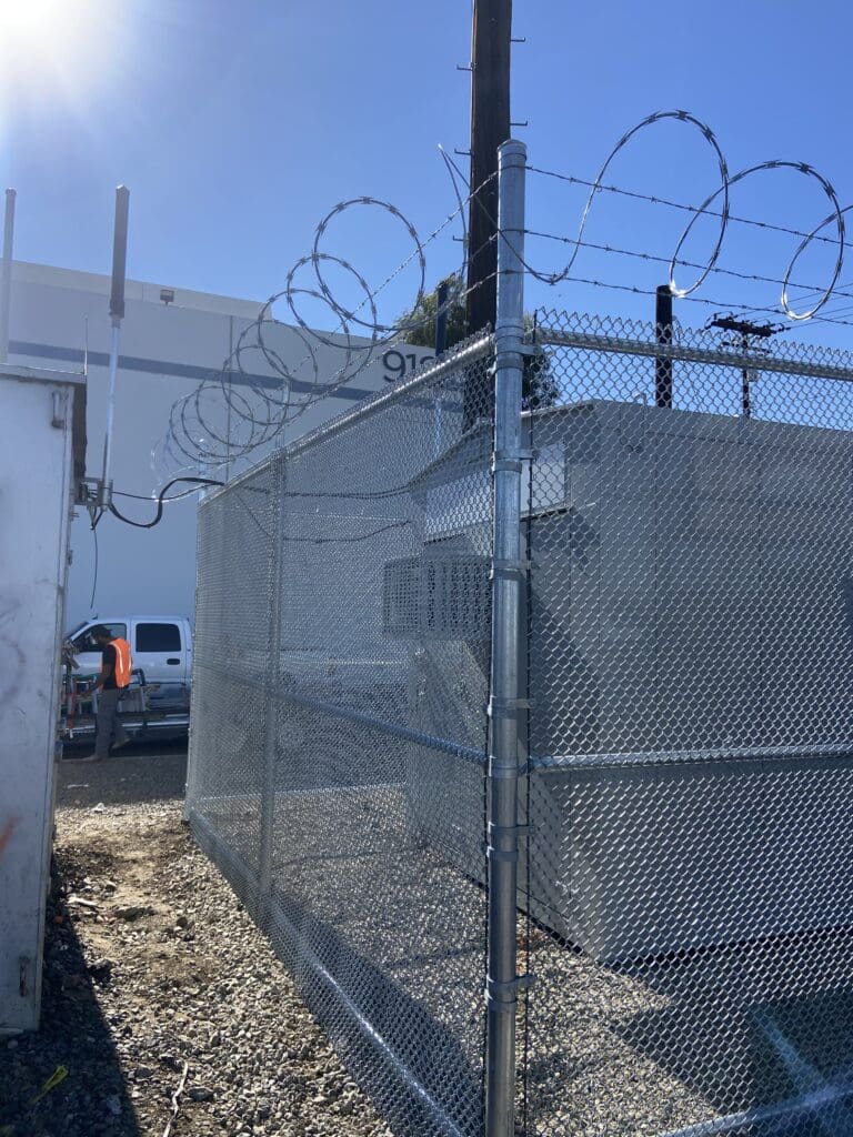 Chain link with razor wire — commercial
