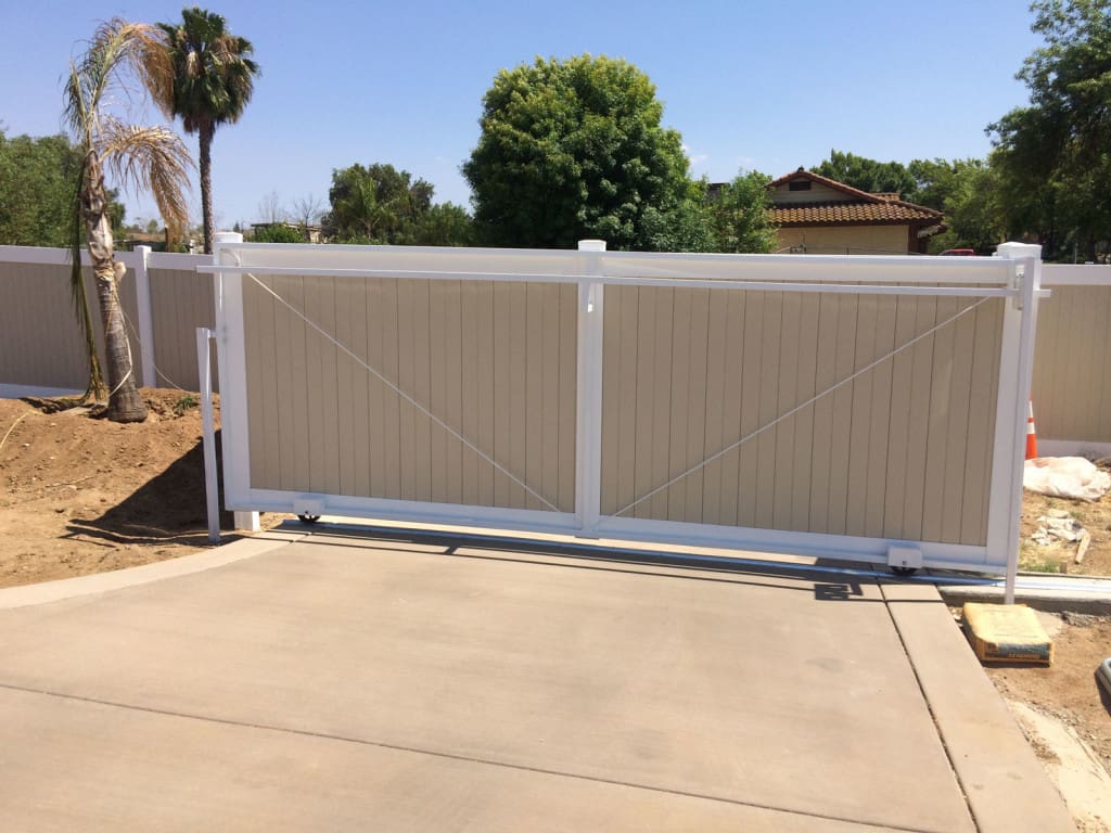 White vinyl privacy fence — side yard