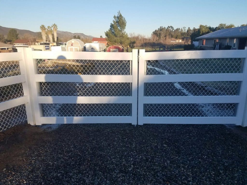 White vinyl fence backyard