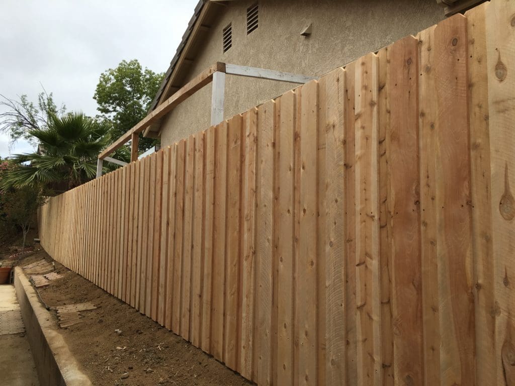 Vinyl fence along property line